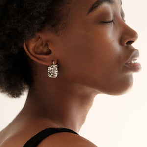 From Ancient Royalty to Runway Glam: The Untold Power of Earrings