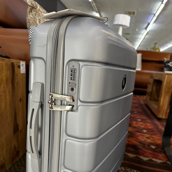 Delsey Silver Suitcase