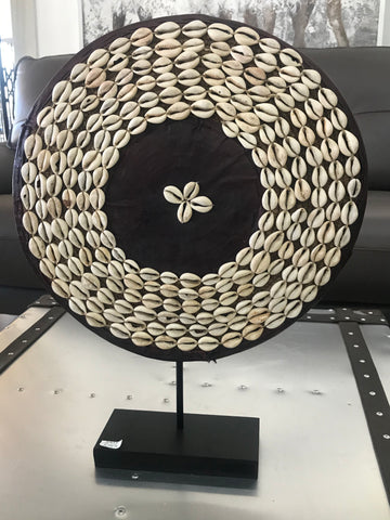 Leather shield with shells